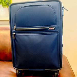 TUMI 22”Blue Spinner carry on luggage